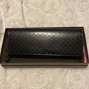 Gucci black patent clutch